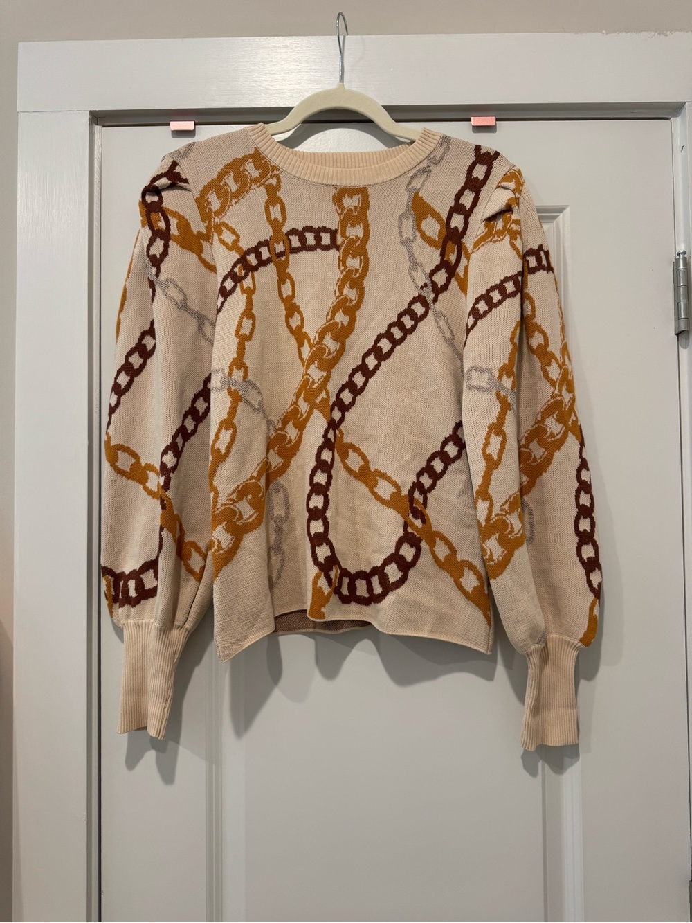 Flying tomato chain sweater
